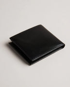 PRUGS: Embossed Corner Leather Bifold Coin Wall
