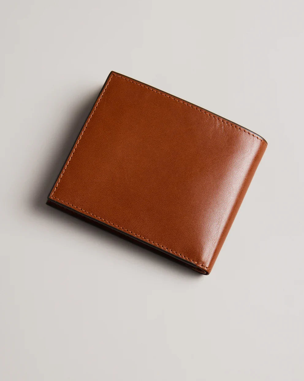 PRUGS: Embossed Corner Leather Bifold Coin Wall